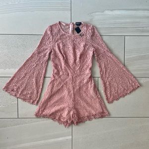 Bebe Pink Lace Up Flutter Sleeve Romper